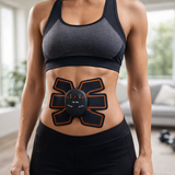 Estimulador muscular EMS en uso por mujer fitness